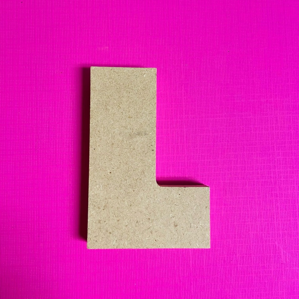 New. Block chunky wooden letter “L”. Natural tan wood color.